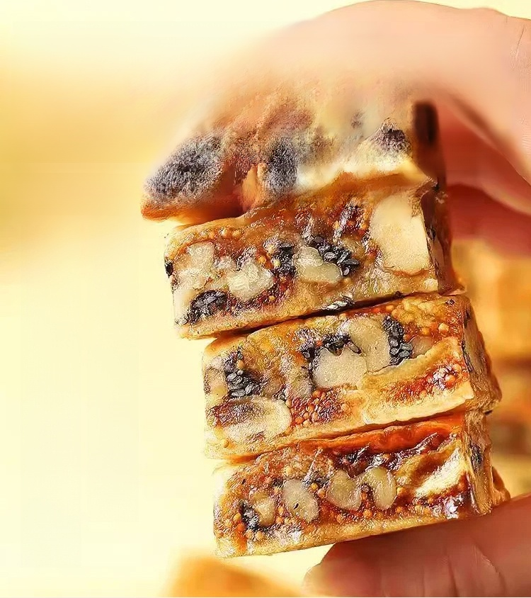Pastelito de higo, sésamo negro y nueces. Sin freír, sin aditivos, alto contenido nutricional y fibr.Cuanto más se mastica, más fragante resulta; saludable y no demasiado dulce