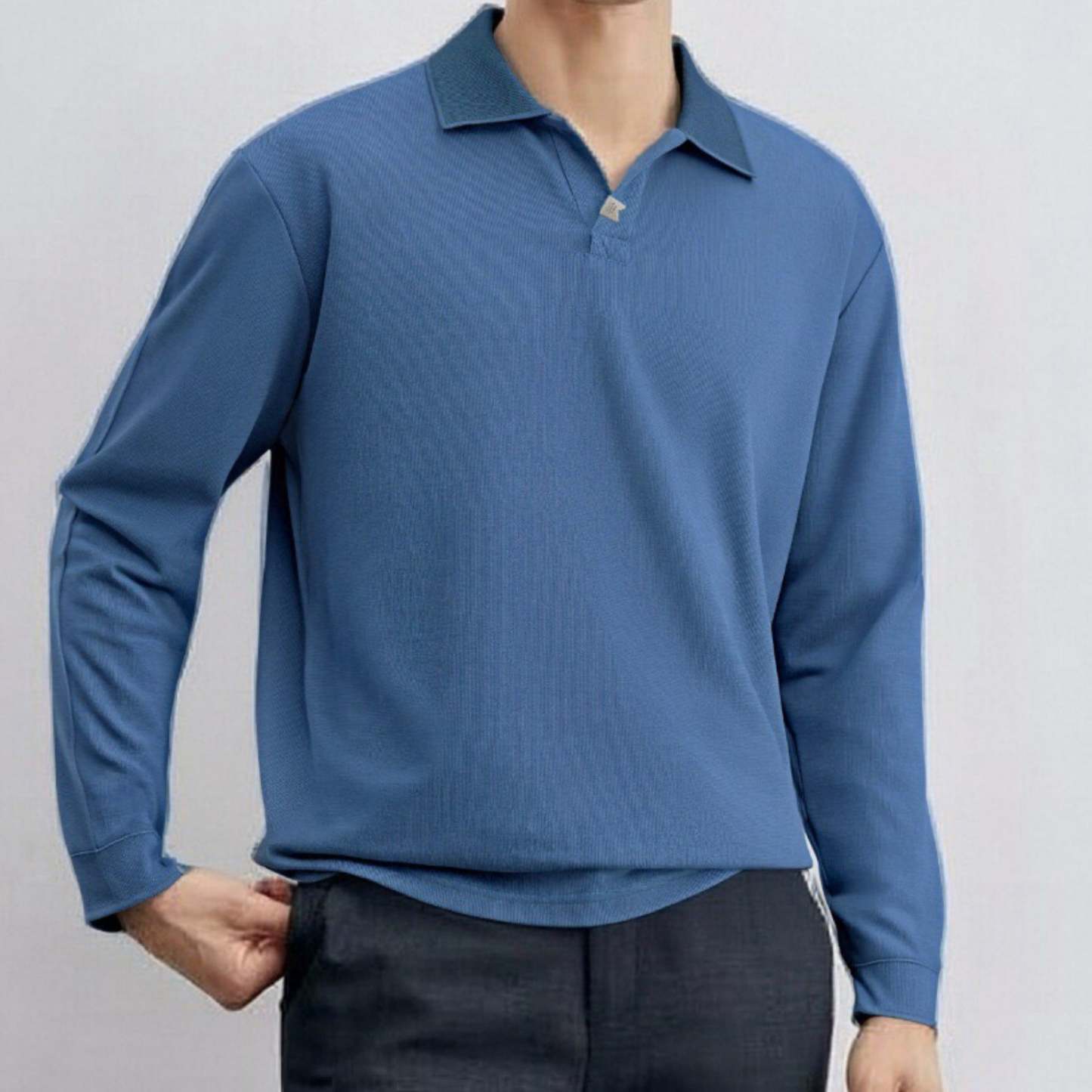 Loose-fitting, casual long-sleeved men's polo shirt with a collar.