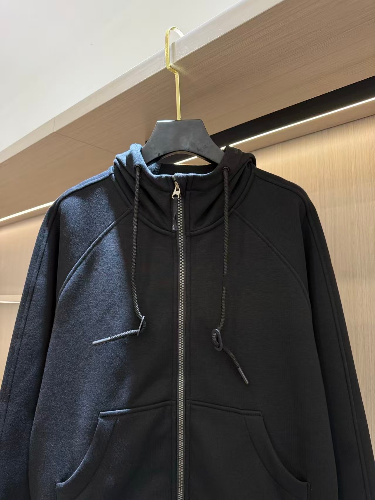 Athletic zip-up hooded cardigan sweatshirt