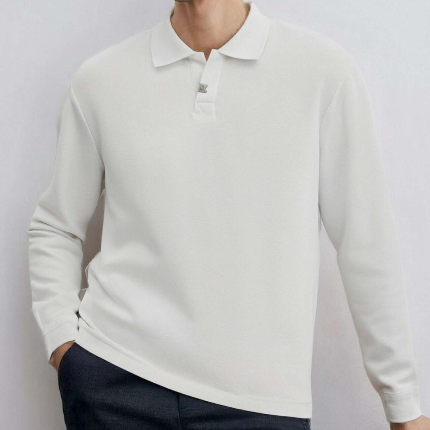 Loose-fitting, casual long-sleeved men's polo shirt with a collar.