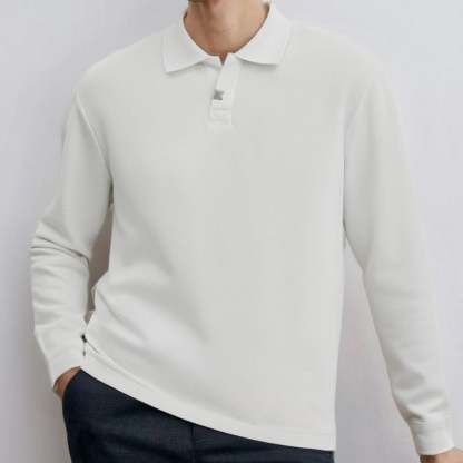 Loose-fitting, casual long-sleeved men's polo shirt with a collar.