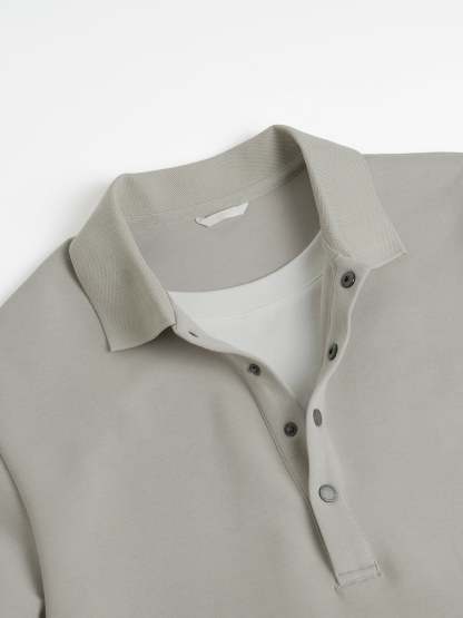 Loose-fitting, casual long-sleeved polo shirt with a collar