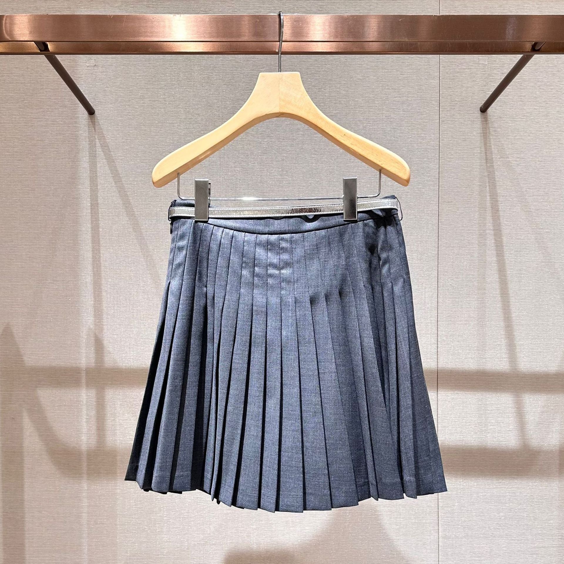 A-line pleated skirt with a belt
