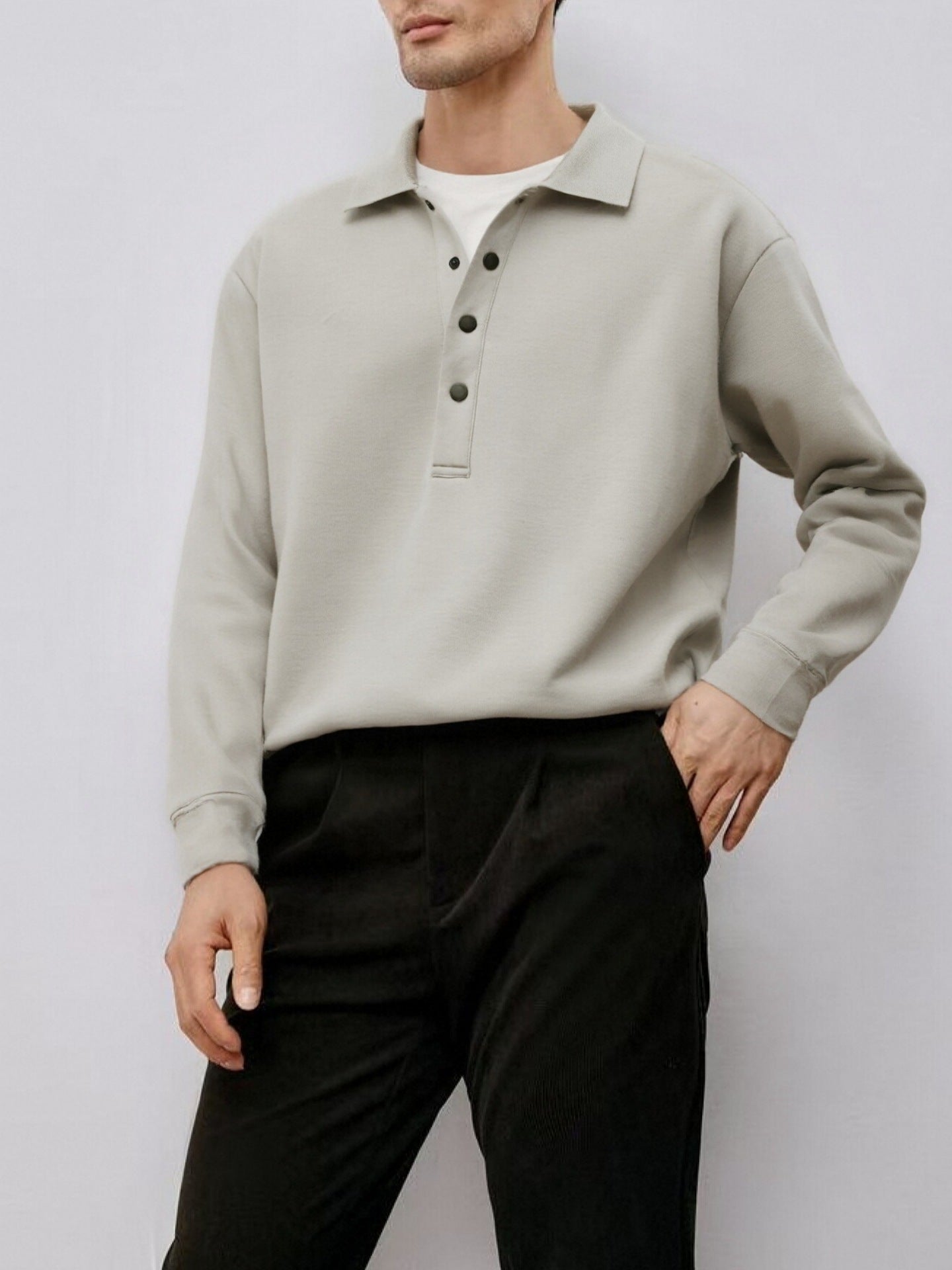 Loose-fitting, casual long-sleeved polo shirt with a collar
