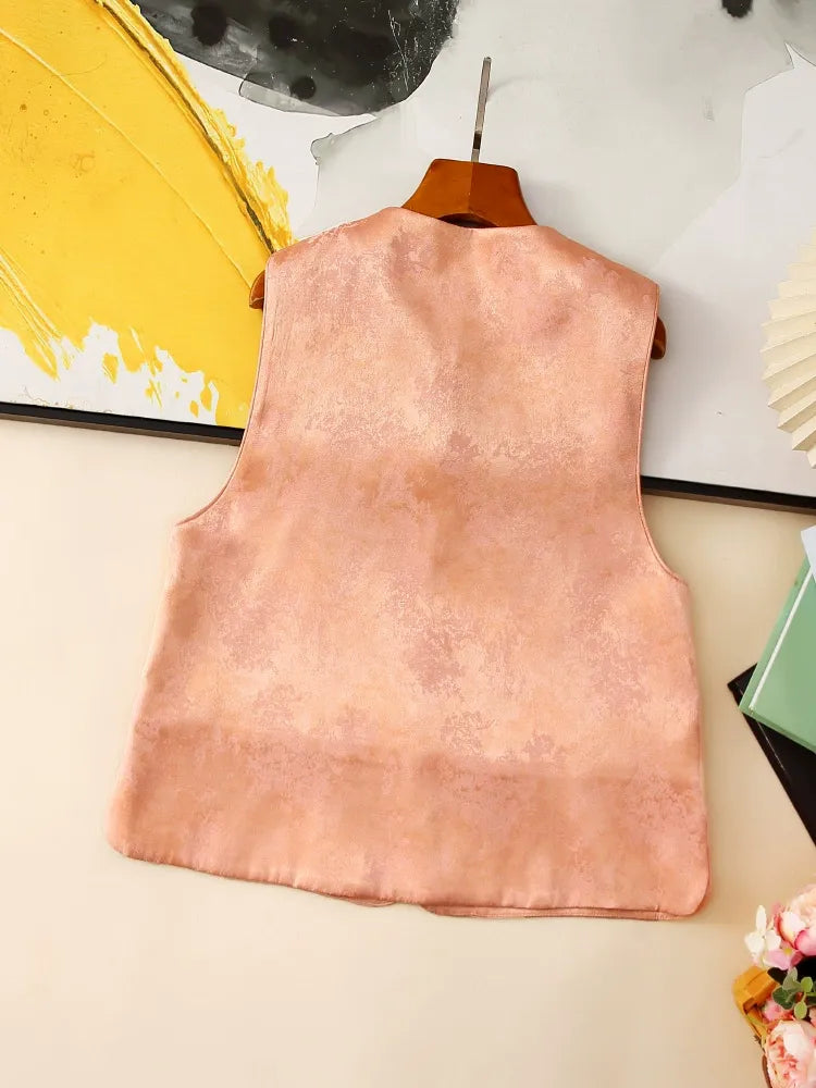 Embroidered and beaded sleeveless vest