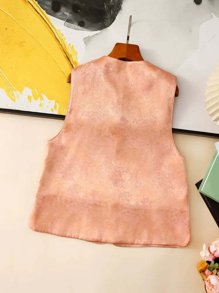 Embroidered and beaded sleeveless vest