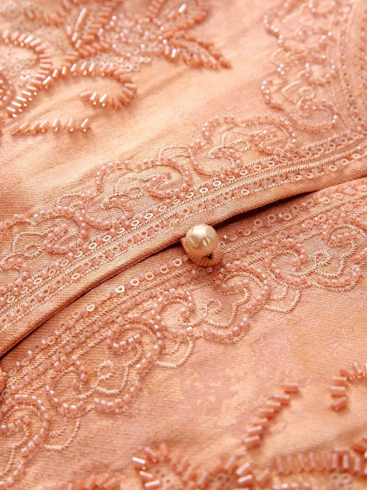 Embroidered and beaded sleeveless vest