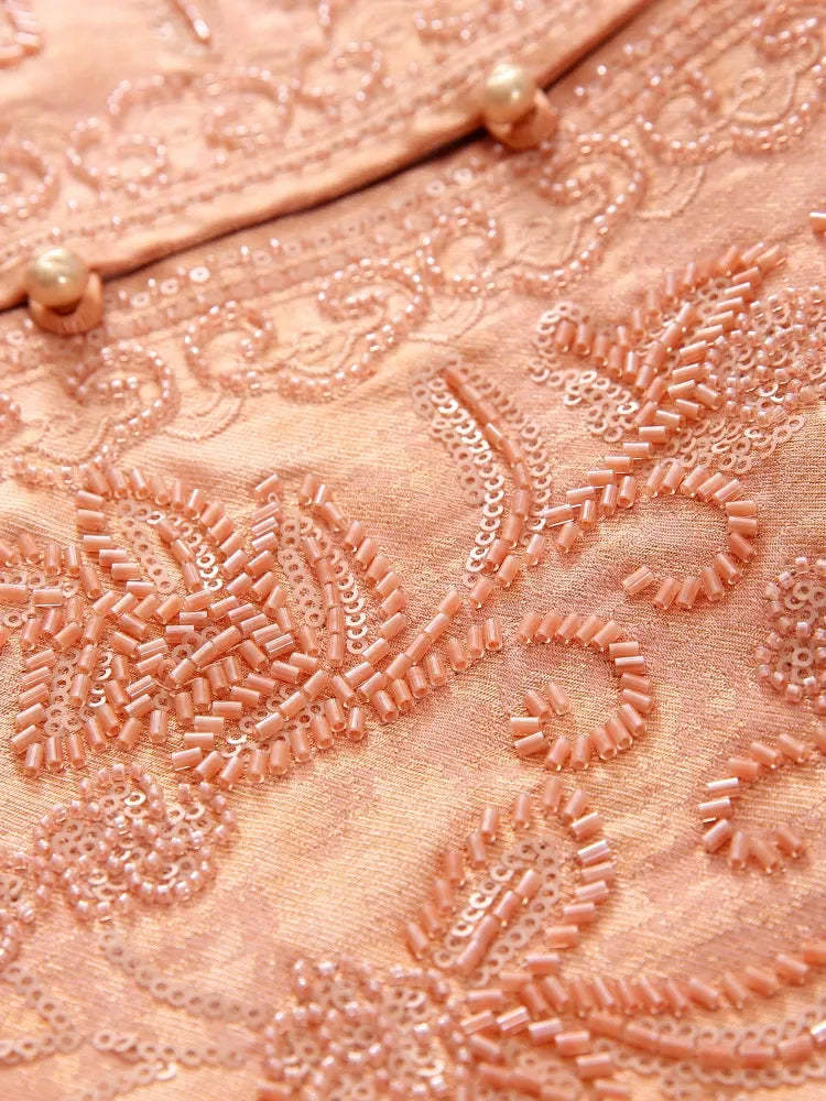 Embroidered and beaded sleeveless vest