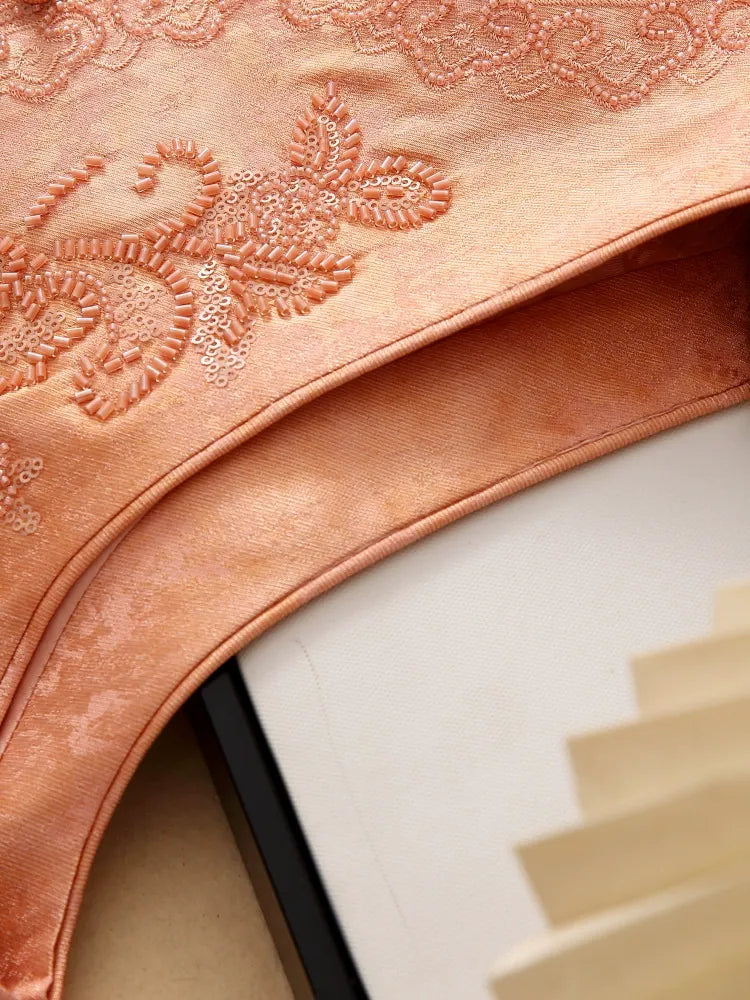 Embroidered and beaded sleeveless vest