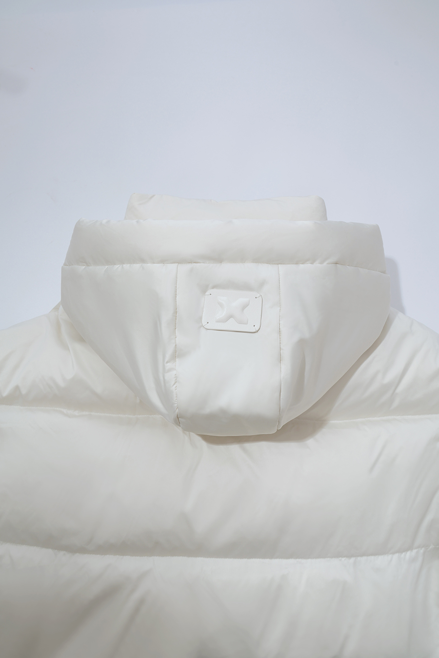 Hooded Down Jacket with Embossed Leather Patch|AMII