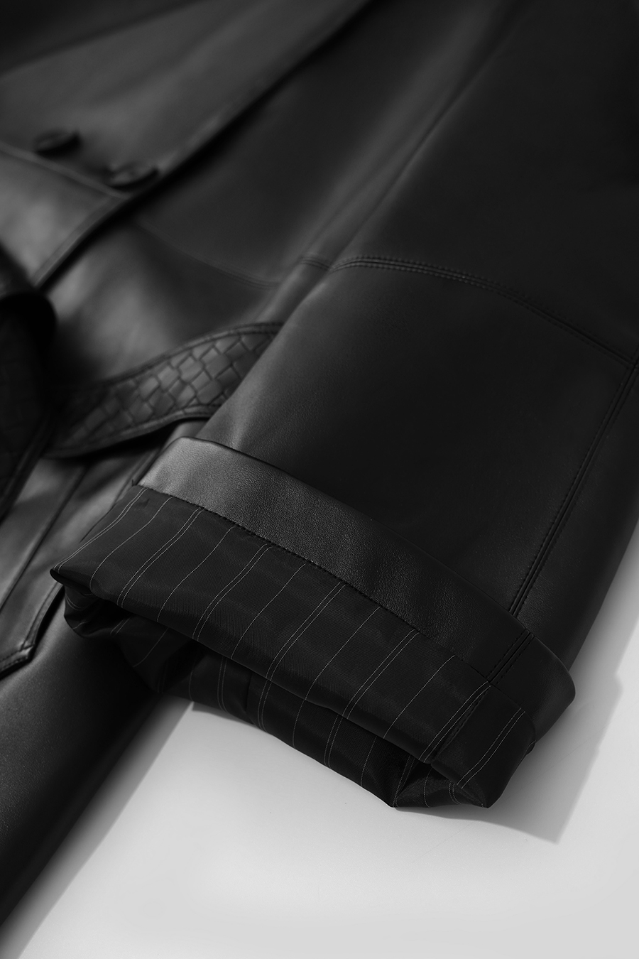 Belted eco‑leather jacket|AMII