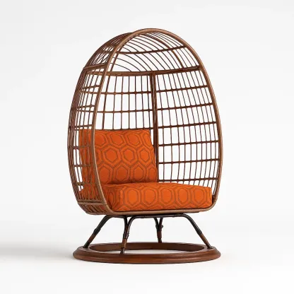 Poltrona a uovo in rattan con cuscino arancione