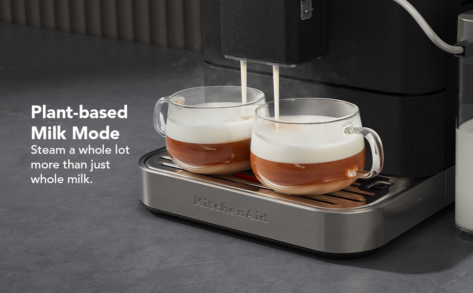 Close up image of 2 lattés being made using the KF8 machine.