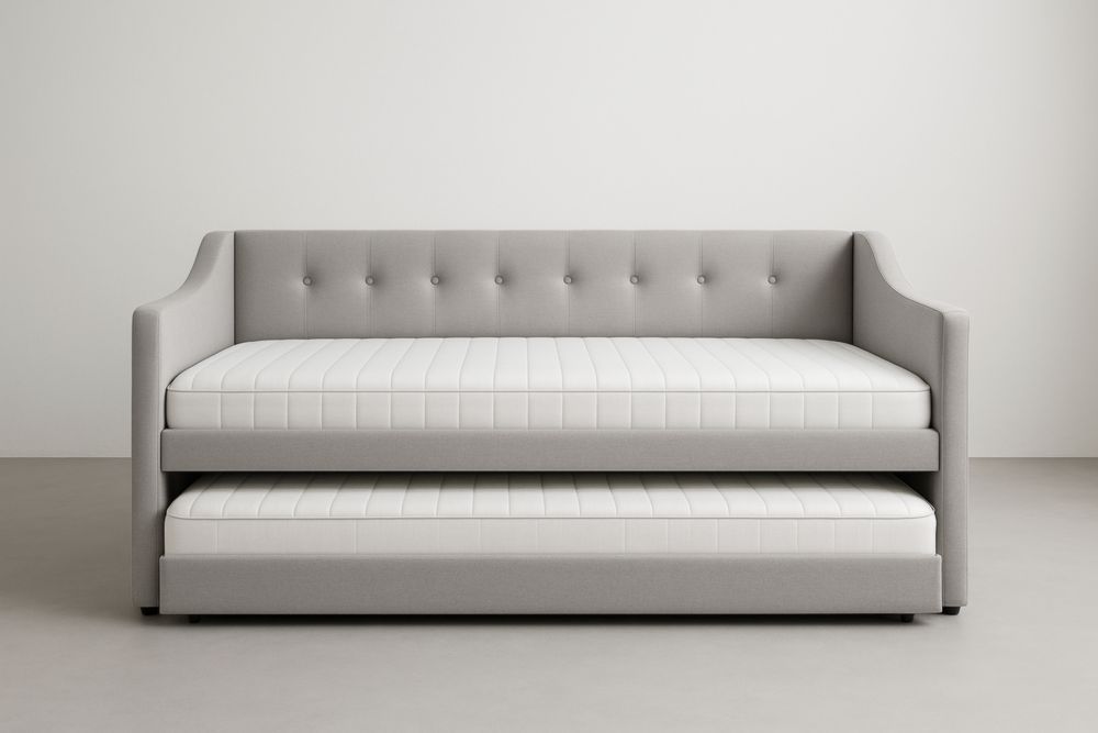 Divano letto con struttura in tessuto grigio e materassi estraibili