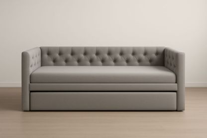 Divano letto estraibile in tessuto grigio con testiera imbottita.