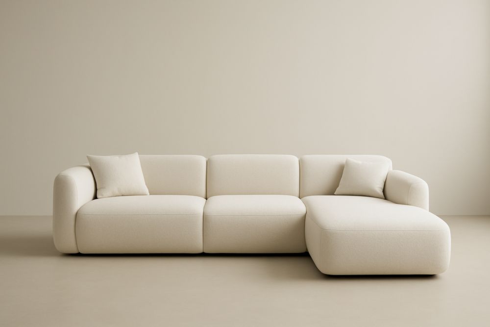 Divano angolare in tessuto beige con chaise longue