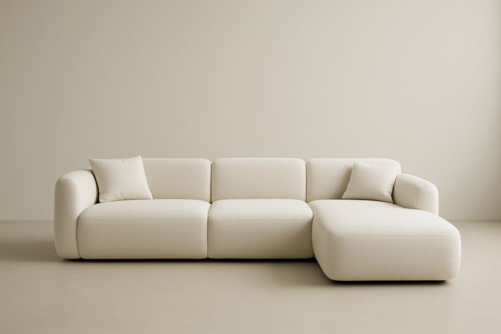 Divano angolare in tessuto beige con chaise longue