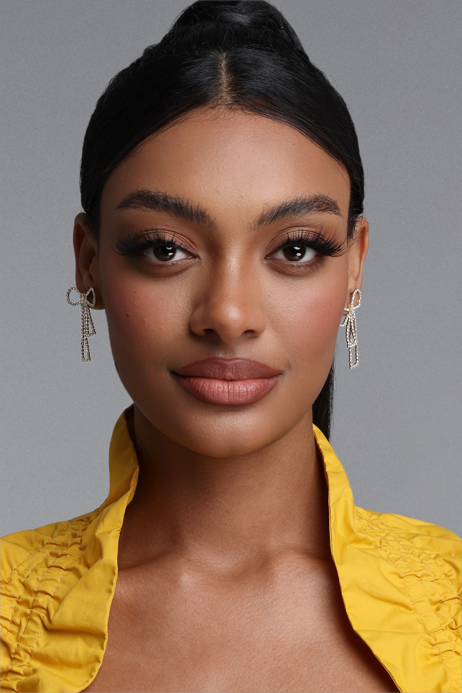 Sling Crystal Bow Tassel Earrings
