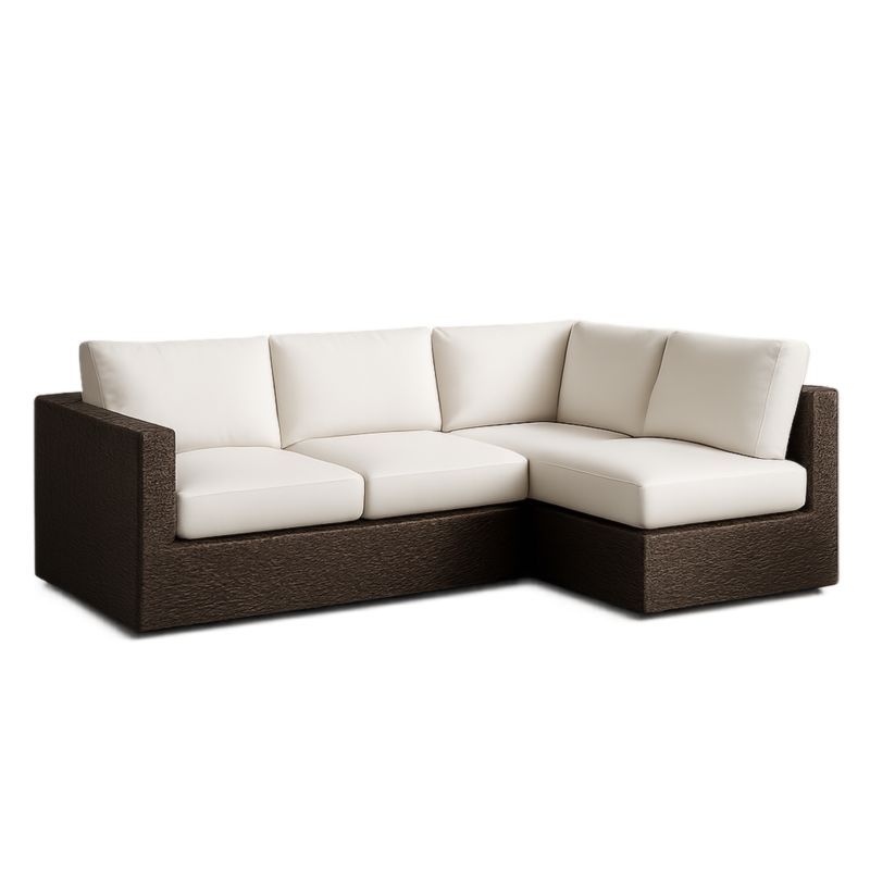 Canapé d'angle en rotin coussins en tissu crème