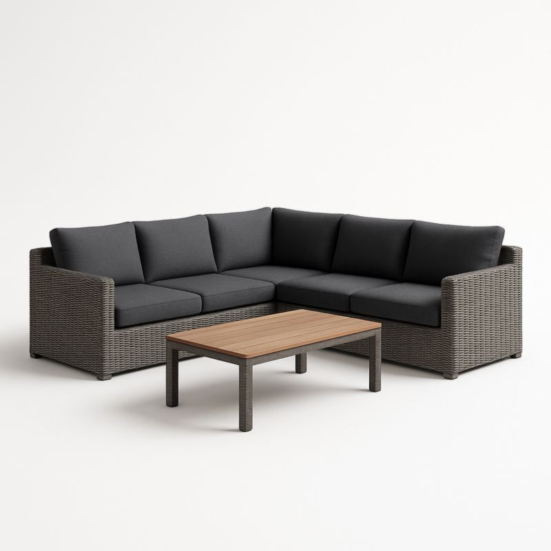 Canapé d'angle en résine tressée avec coussins gris et table en bois