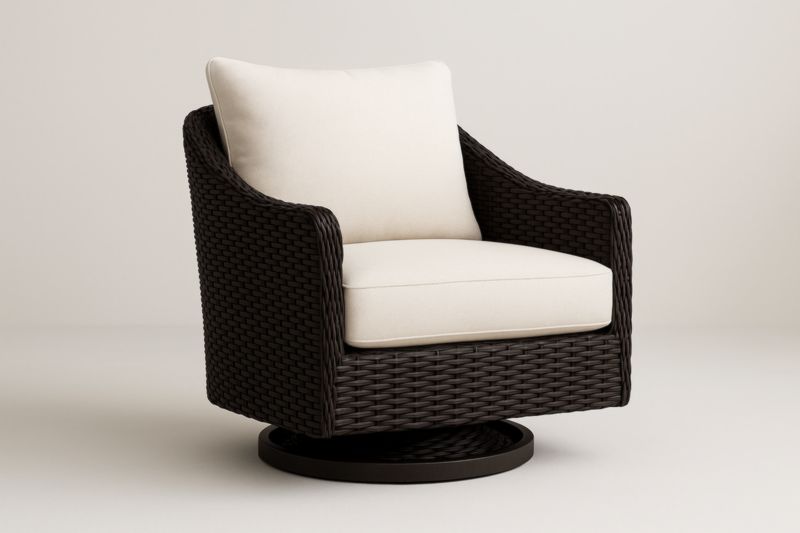 Fauteuil pivotant en résine tressée marron avec coussins crème