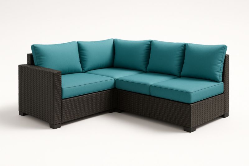 Canapé d'angle extérieur en résine tressée noire avec coussins en tissu bleu