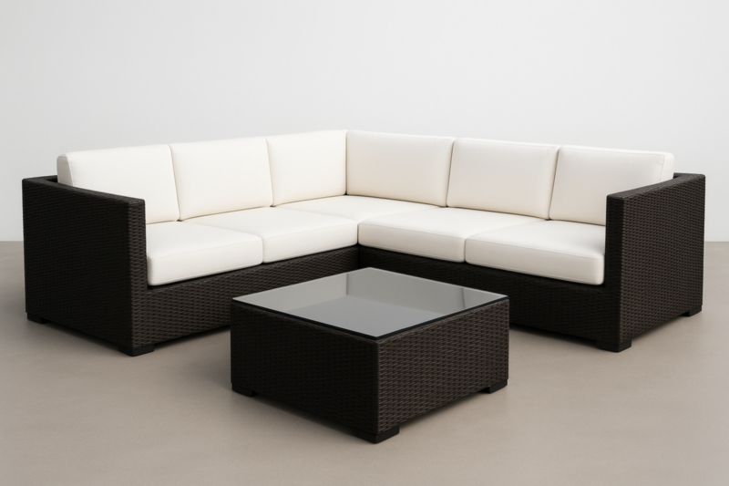 Ensemble d'angle de salon extérieur en résine tressée avec coussins et table basse en verre