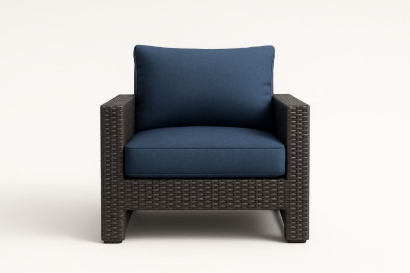 Fauteuil d'extérieur en rotin synthétique noir avec coussins bleus