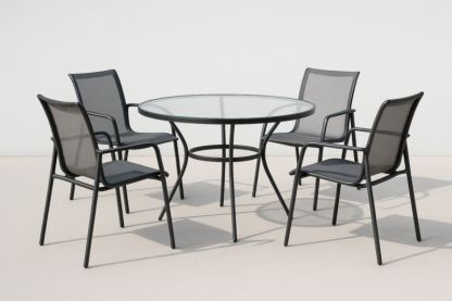 Ensemble table ronde en verre et chaises en métal noir