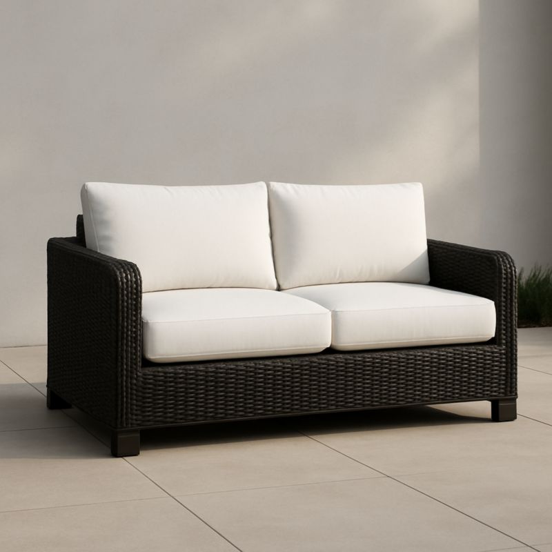 Divano da Esterno in Rattan Nero con Cuscini in Poliestere Bianco