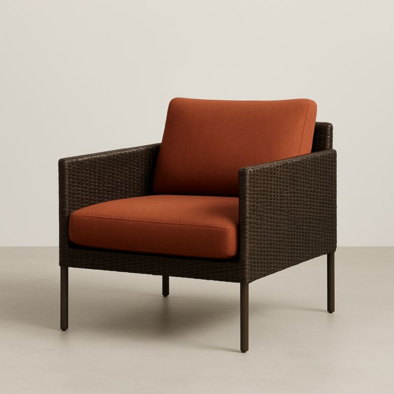 Poltrona da Esterno Intrecciata Marrone con Cuscini Arancioni e Struttura in Metallo