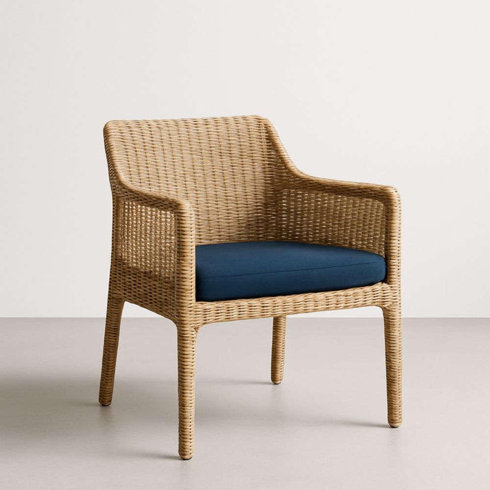 Fauteuil en rotin synthétique avec coussin bleu