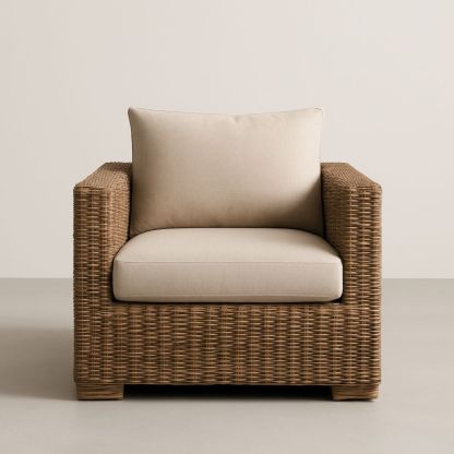 Fauteuil en rotin tressé avec coussin beige