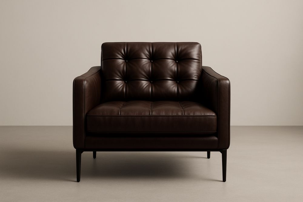 Fauteuil en cuir marron avec des pieds en acier