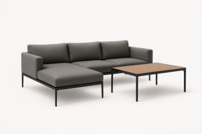 Divano angolare in tessuto grigio con struttura in metallo e tavolino in legno