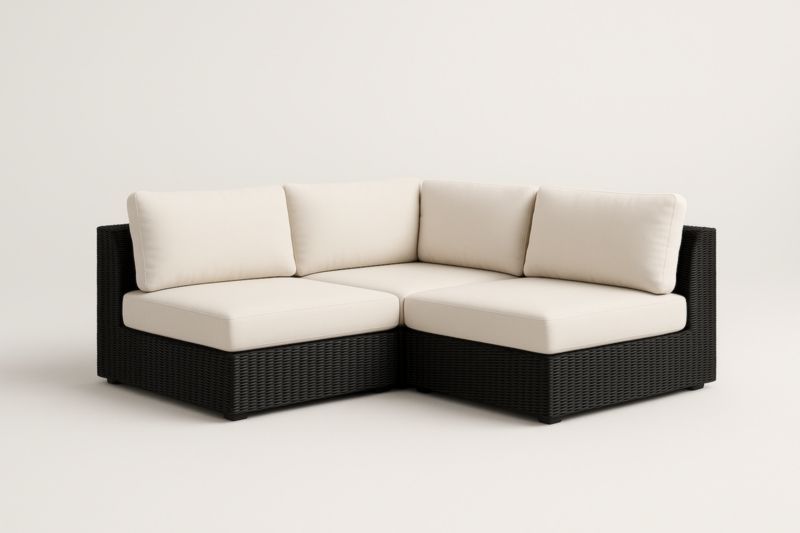 Divano Angolare da Esterno in Rattan Sintetico Nero con Cuscini Crema