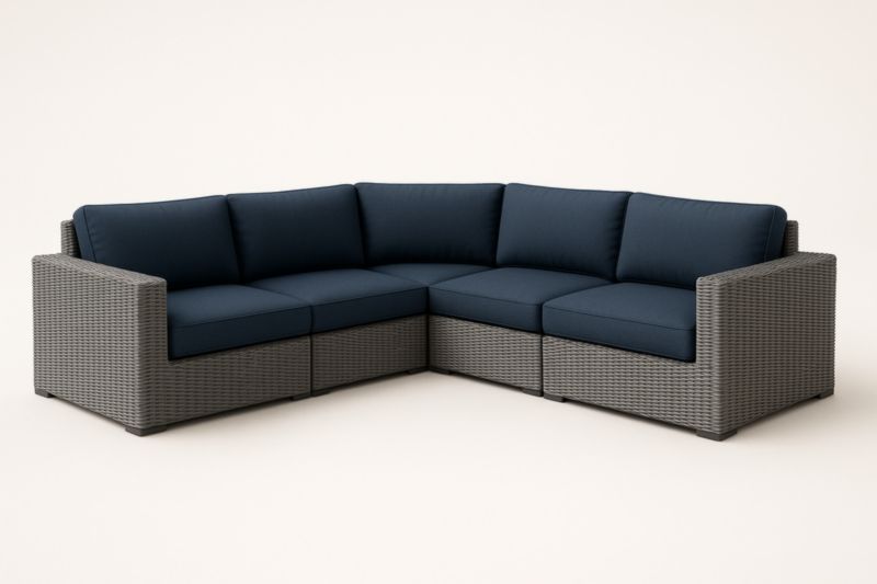 Divano modulare angolare in rattan sintetico con cuscini blu