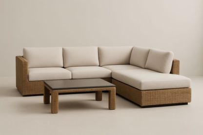 Divano angolare in rattan sintetico con tessuto beige e tavolino