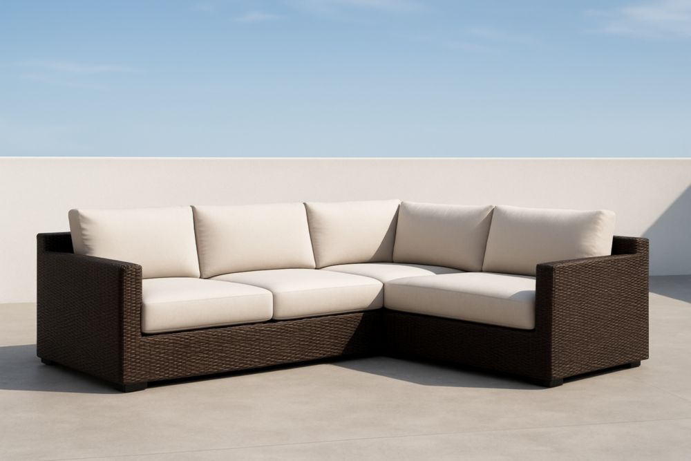 Divano angolare da esterno in rattan sintetico con cuscini beige