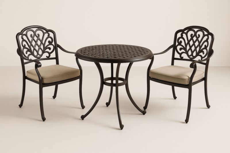 Set tavolo rotondo in metallo nero con due sedie e cuscini-Kroneliva