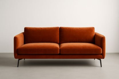 Divano in velluto arancione con struttura in metallo