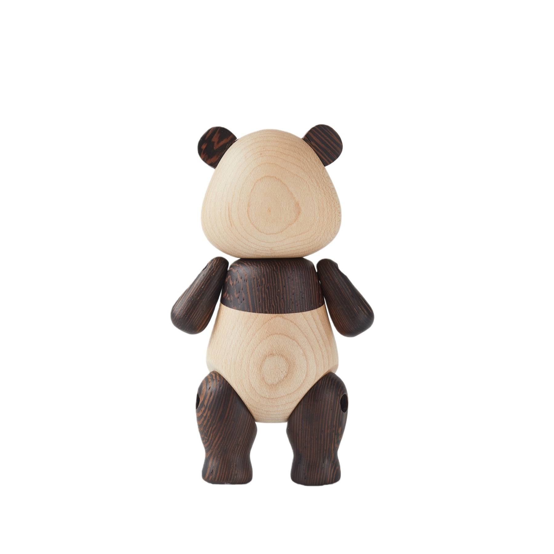 Close-up of handcrafted wood details on panda figurine