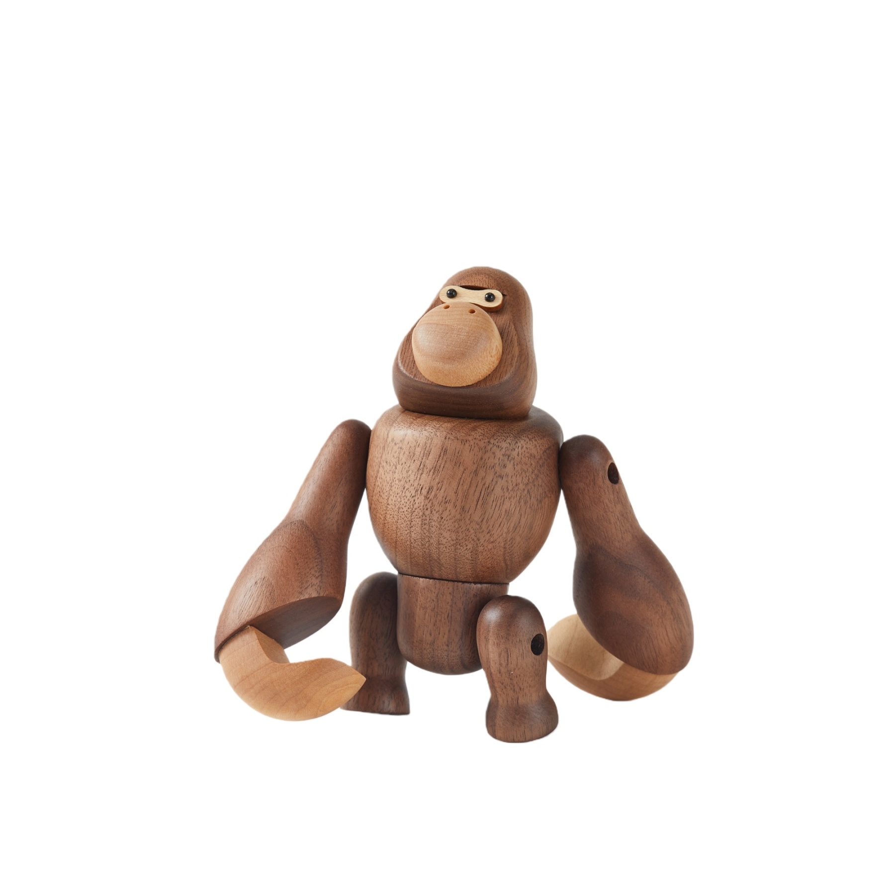 Handcrafted walnut and beechwood gorilla wooden figurine with expressive design