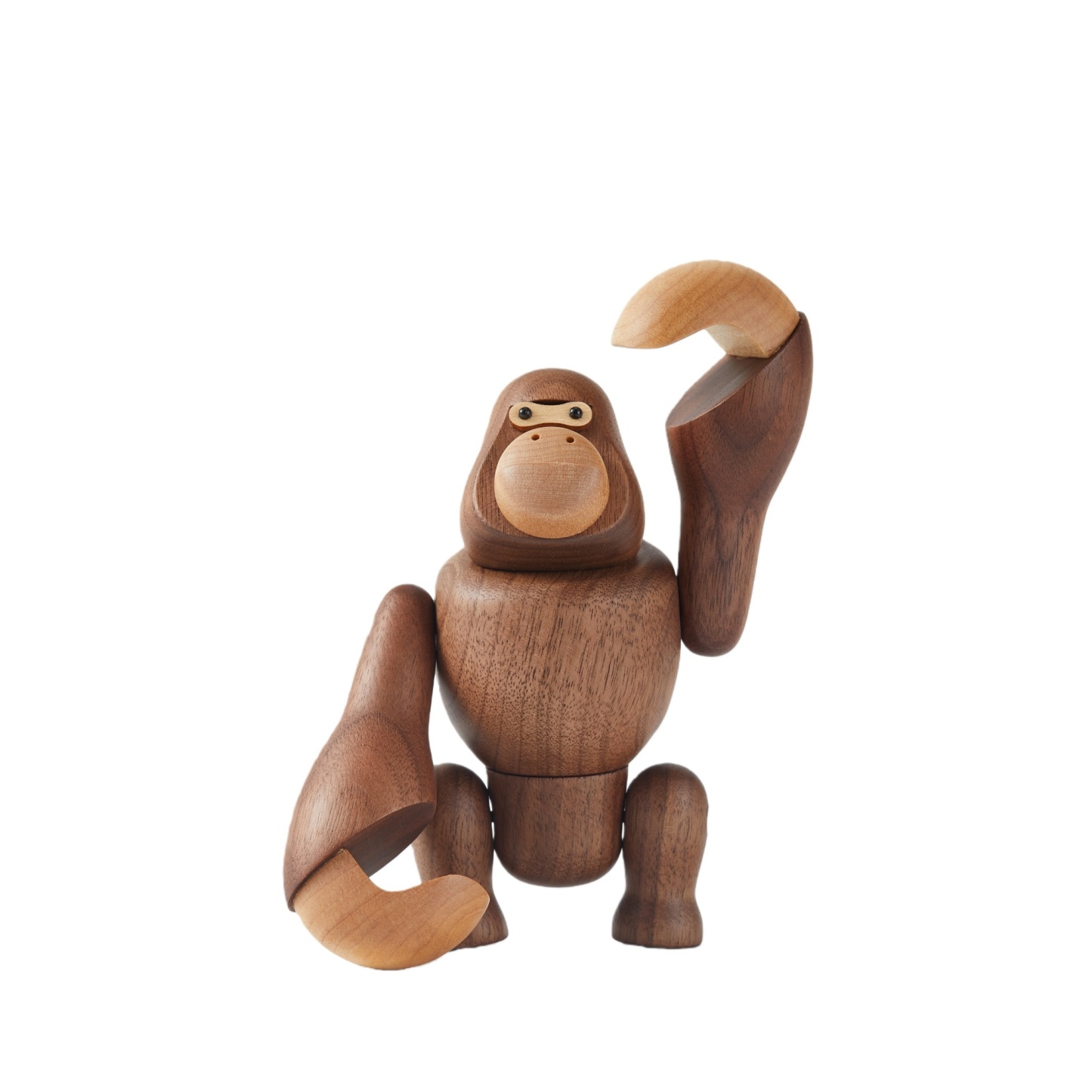 Handcrafted wooden gorilla figurine used as statement home decor