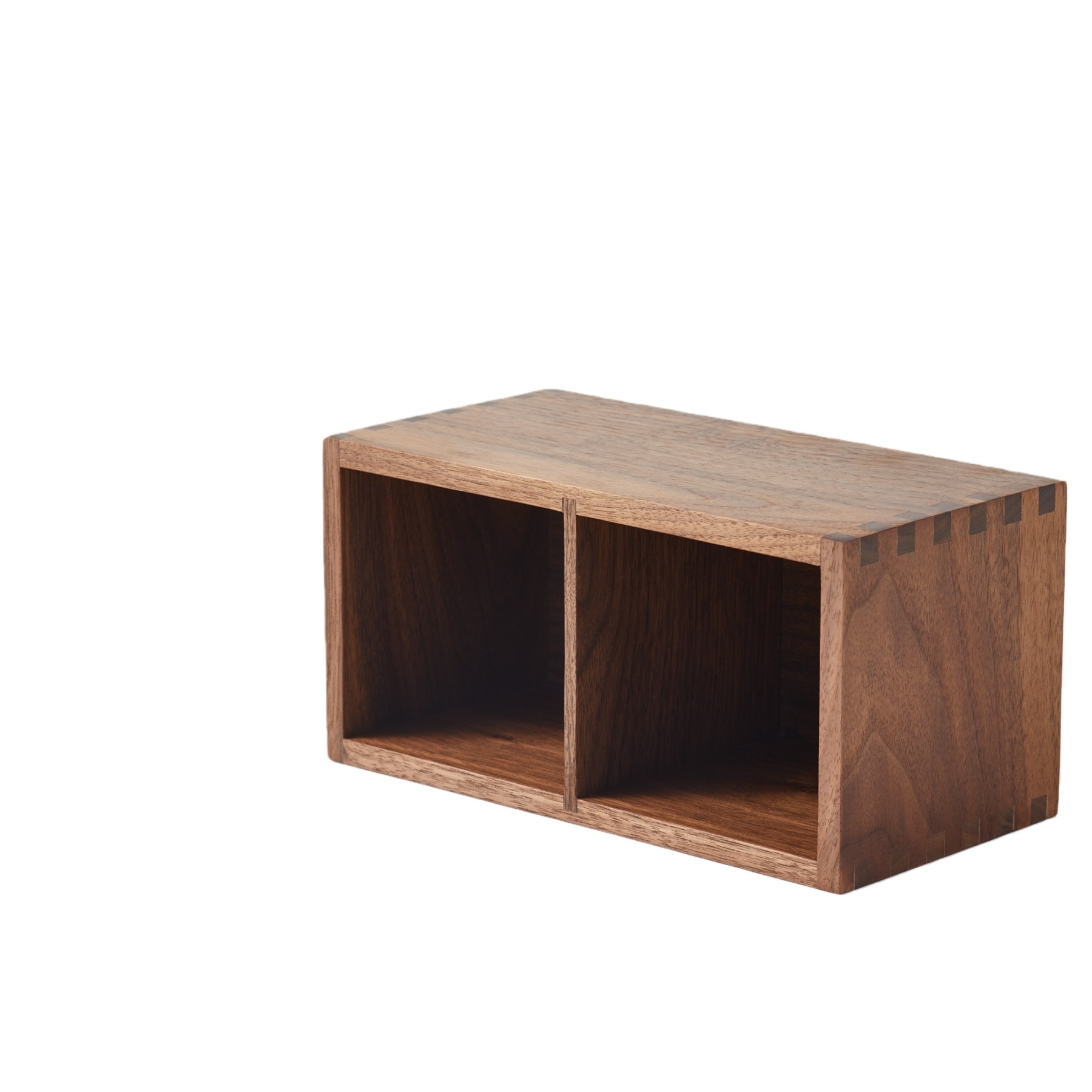 Close-up of handcrafted walnut wood grain on pen holder