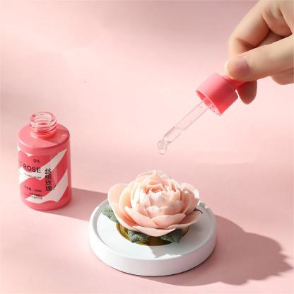 Jingdezhen porcelain peony art piece under glass dome on soft pink background