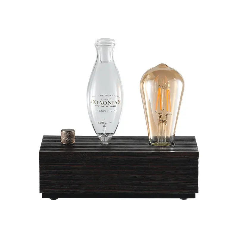 Retro style aromatherapy nebulizer with dark wood base.