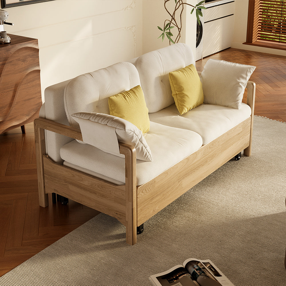 Side view of fabric sofa bed with spacious storage area revealed