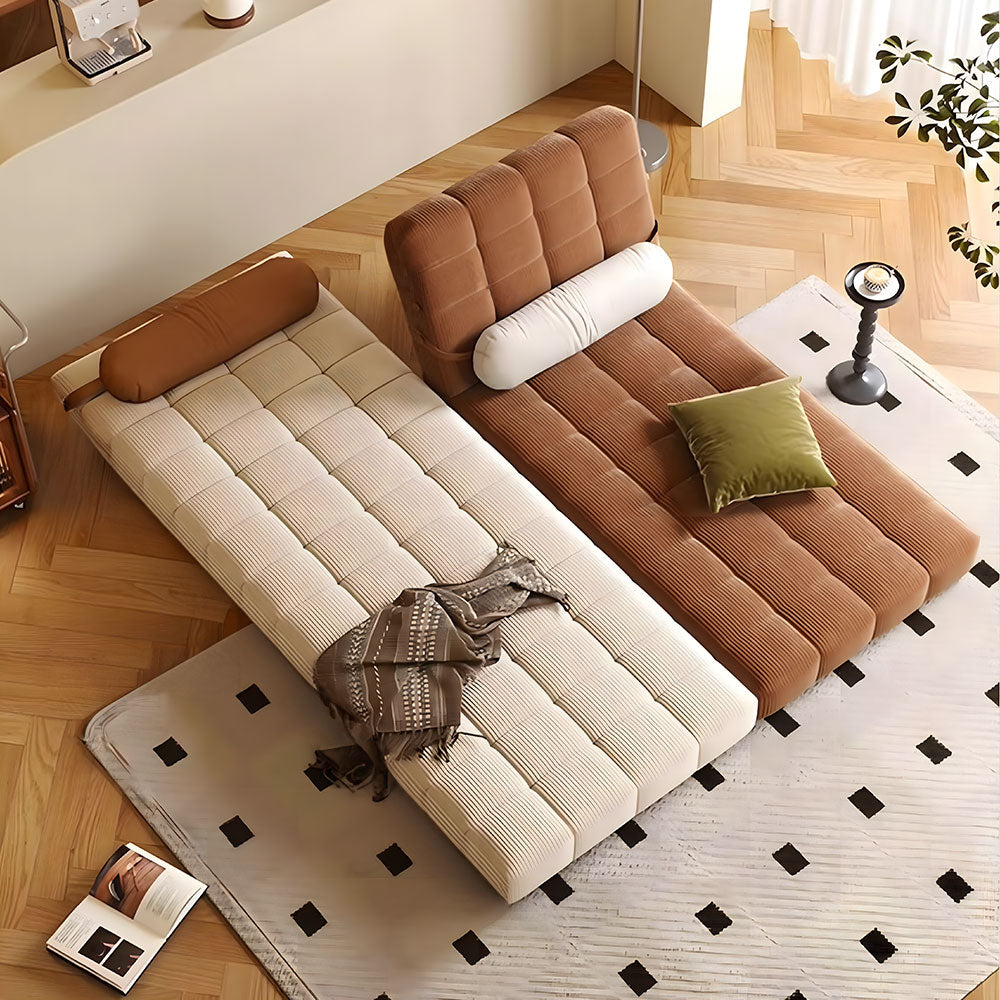 Foldable sofa bed styled in a small living room corner with cozy decor