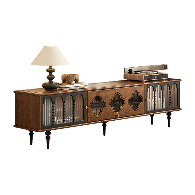 Wooden entertainment console with decorative elements on a white background